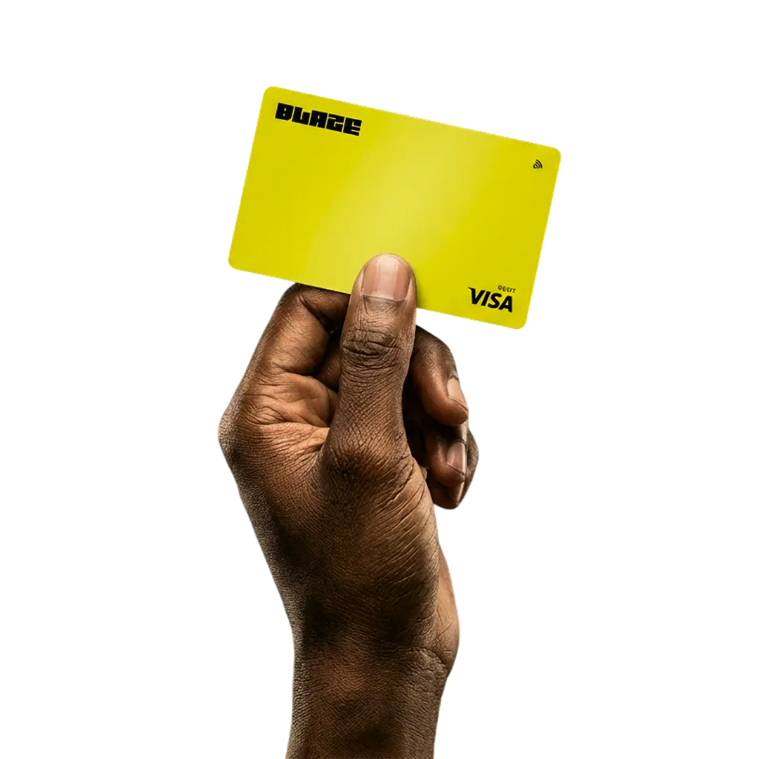 Hand holding Blaze Visa card
